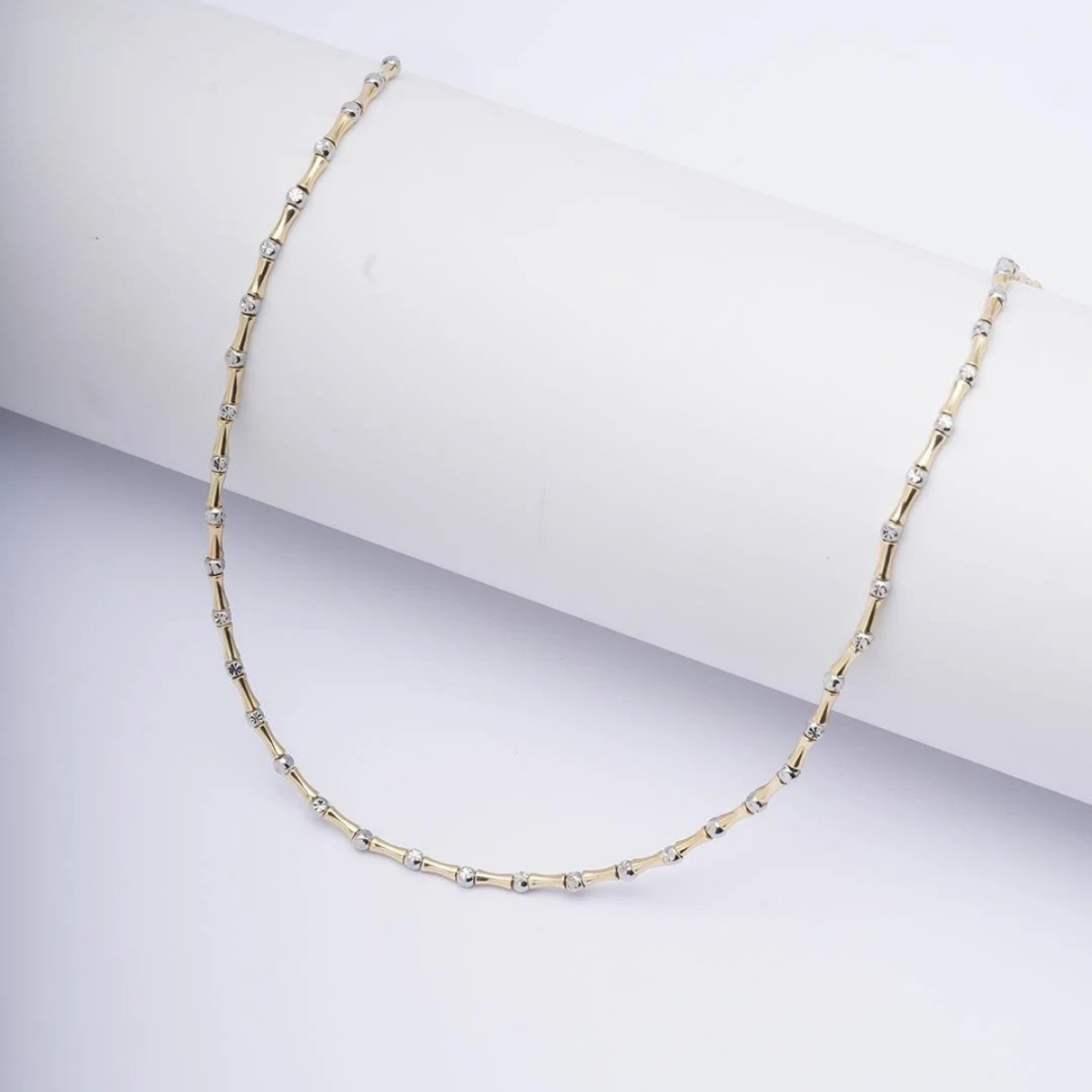 14 AYAR ALTIN RENKLİ TAŞLI ÇELİK KEMİK KOLYE