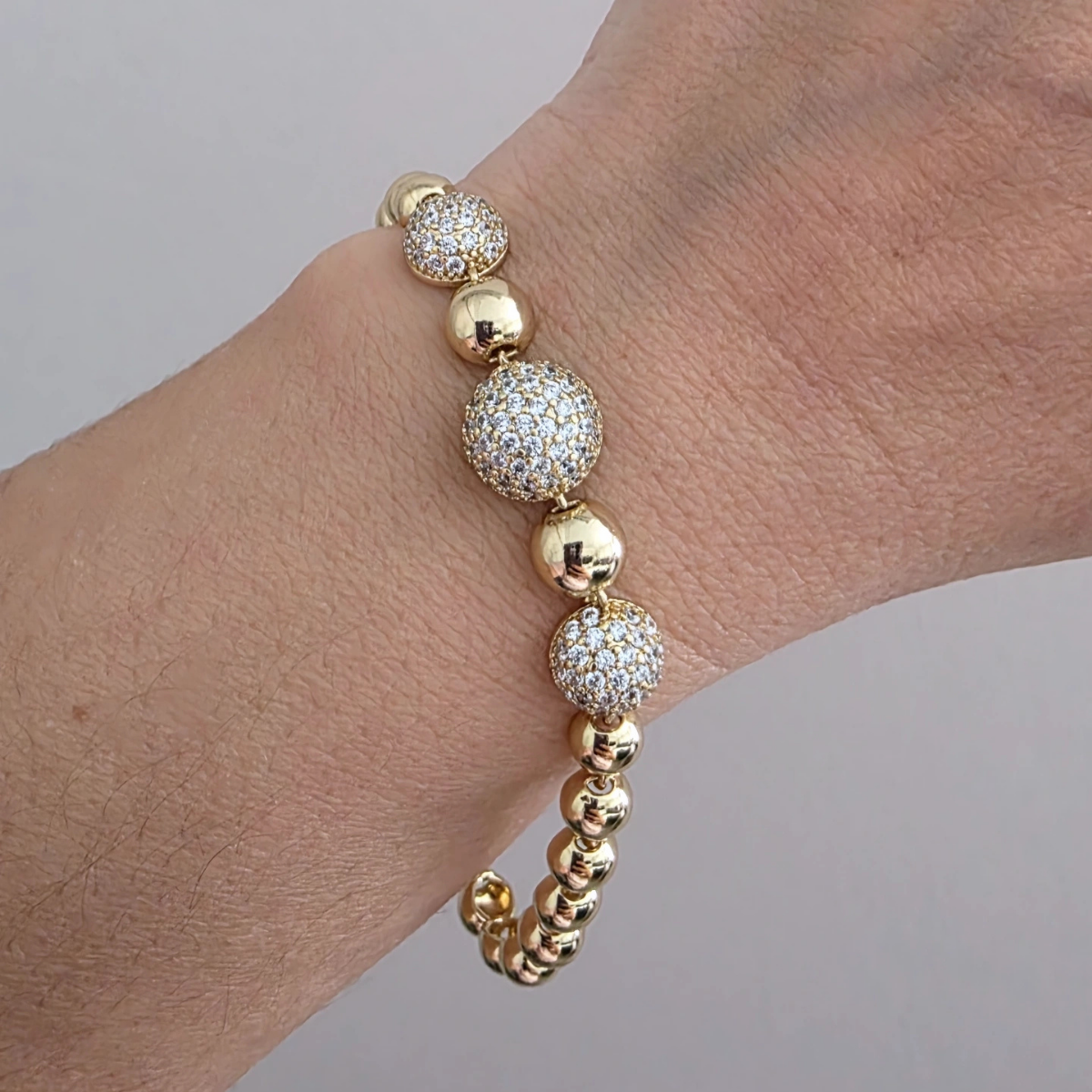 14 AYAR ALTIN RENKLİ ZİRKON TAŞLI TOP BİLEKLİK